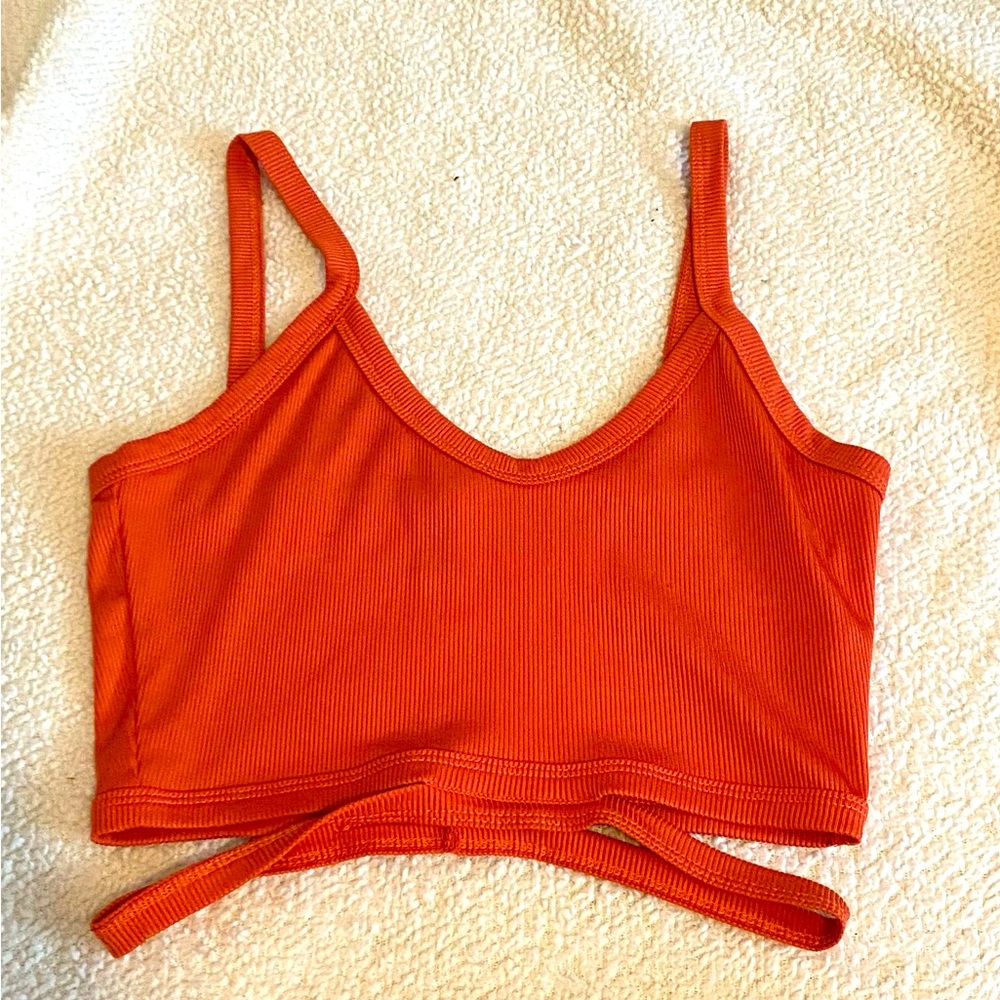 Orange cropped tank top with cut outs